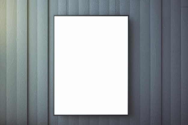 Blank picture frame on a concrete wall mock up