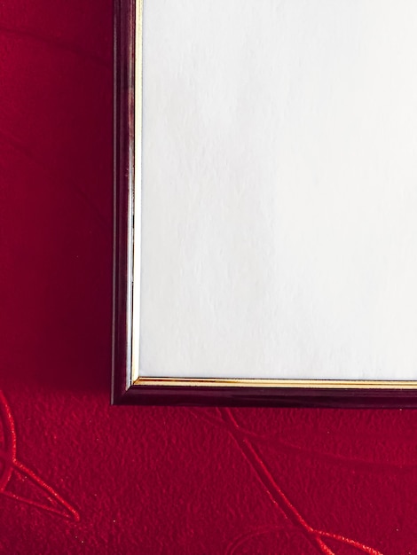 Blank picture frame detail on red background luxury home decor and interior design poster print and ...