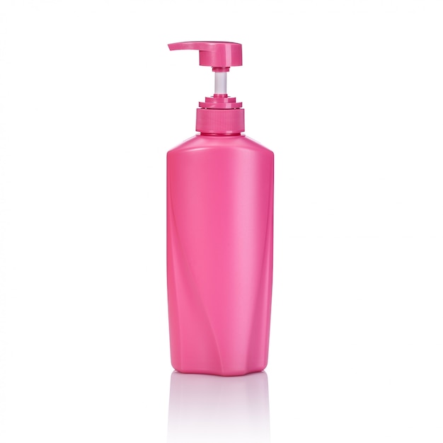 Blank pink plastic pump bottle used for shampoo or soap.