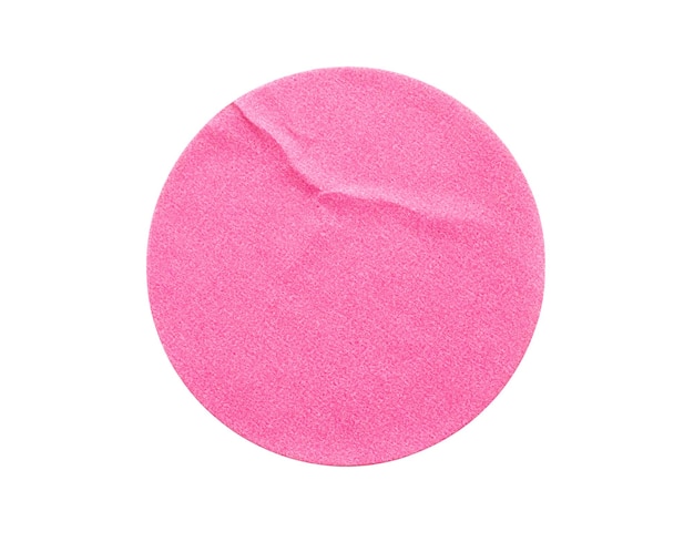 Blank pink round adhesive paper sticker label isolated on white background