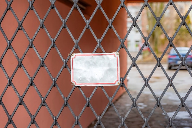 Blank plaque on the black gate