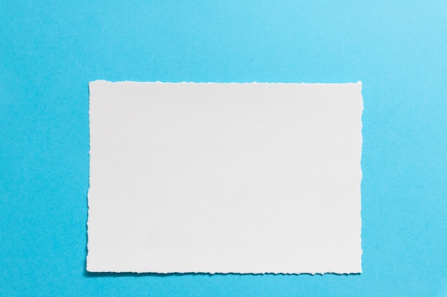 Blank postcard template on a blue background.