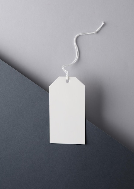 blank price tag on black and gray background creative layout minimalism composition