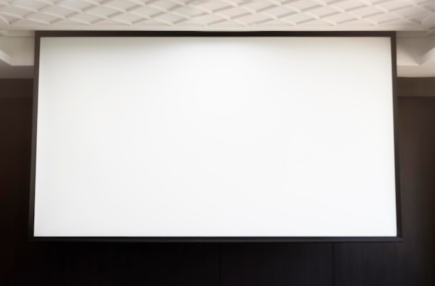 Blank projector screen in meeting room