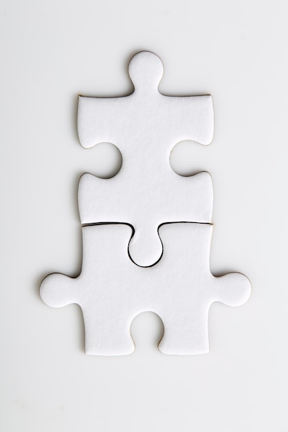 Blank puzzle pieces on a white background