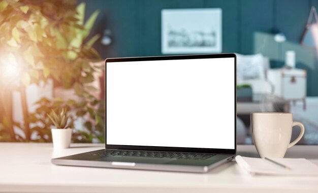 Blank screen laptop on desk