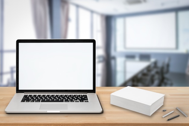 Blank screen notebook on wooden table