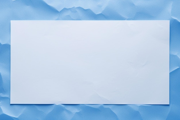 Foto foglio di carta bianco su sfondo blu mockup per la progettazione