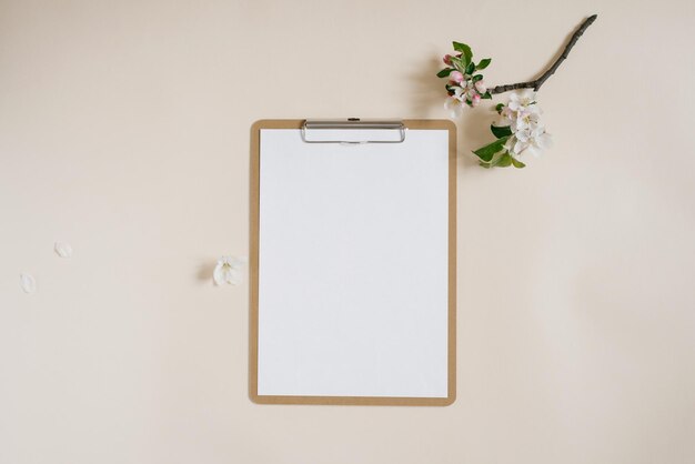 Blank sheet of paper with clipboard for tablet with copy space for copy beautiful home office table