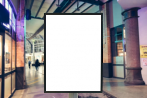 Blank sign with copy space for your text message or mock up content in modern shopping mall.