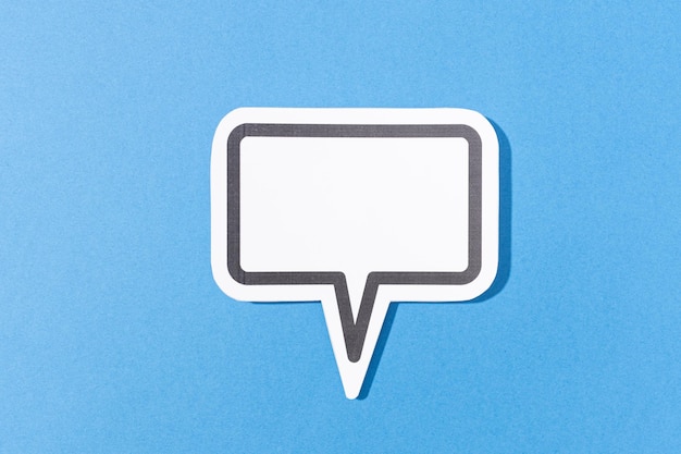 Blank Speech Bubble isolated on blue background Mock up template