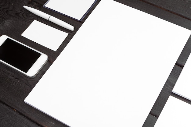 blank stationery set on wood   paper, business cards, booklet, sheets, etc