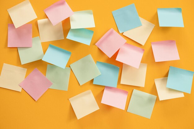 Blank sticky notes on yellow background