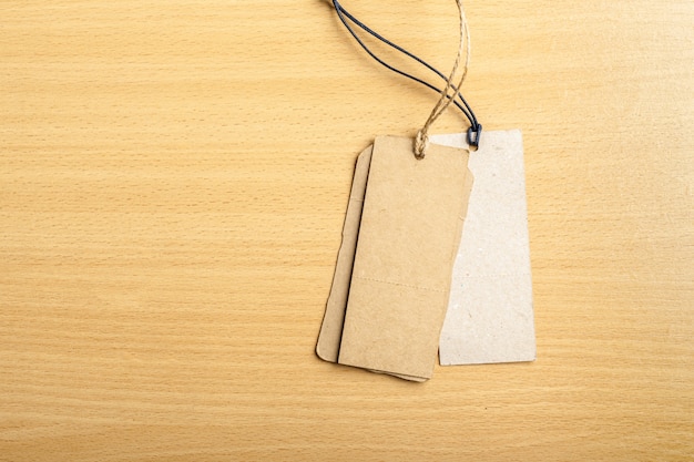 Blank tag on wooden background