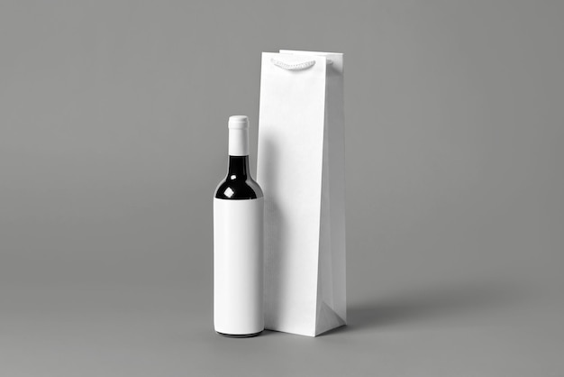 Blank tall white wine bottle bag mockup set isolated 3d rendering Empty carry handbag for wine or vodka mock up Clear paper packaging fit for store branding