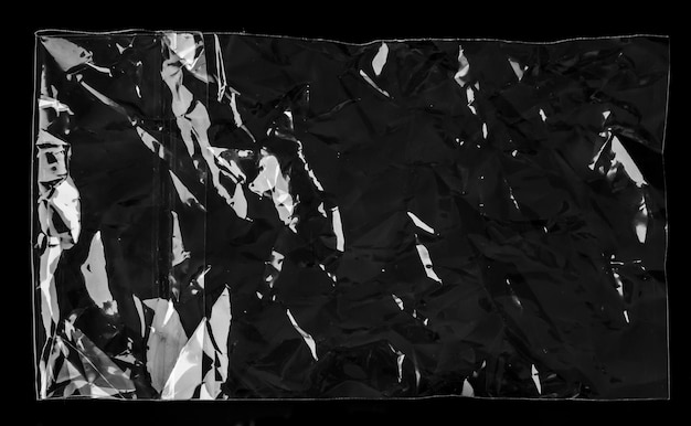 Blank transparent plastic bag overlay on black background