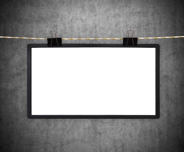 Blank tv screen hanging on rope