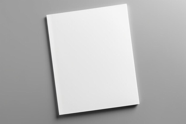 Photo a blank white book on a gray surface