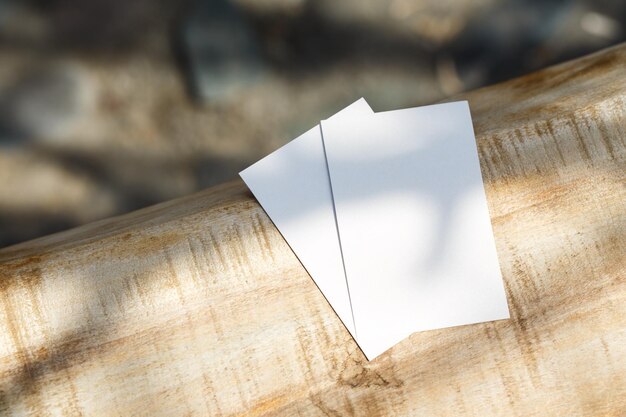 Blank white business card mockup on wood background For your business card design Corporate Stationery Branding Mock up