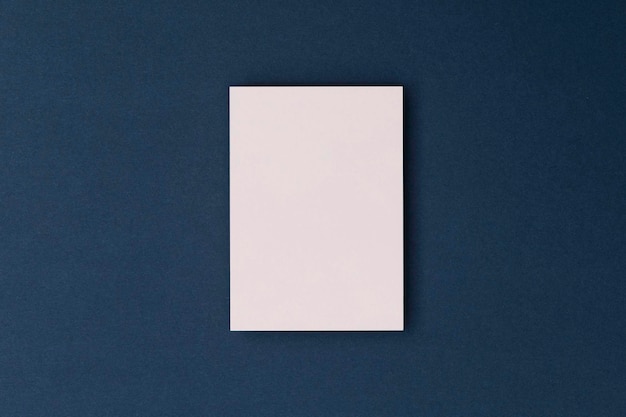 Blank white business card postcard flyer on a blue background