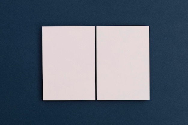 Blank white business card postcard flyer on a blue background