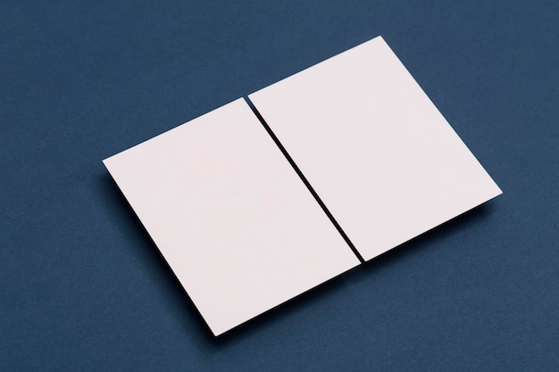 Blank white business card postcard flyer on a blue background