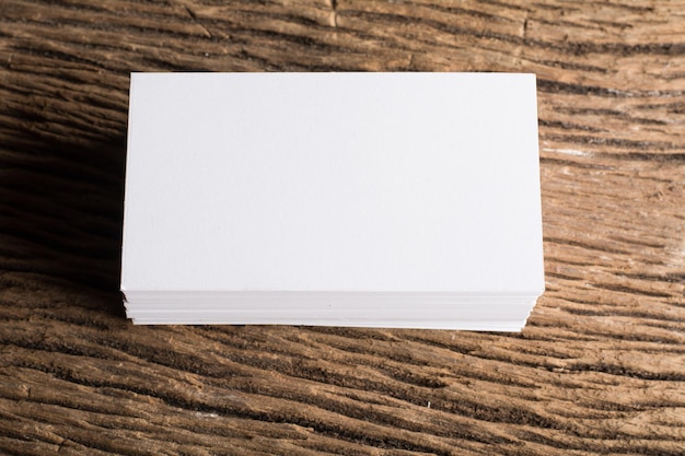 Blank white Business card presentation of Corporate identity on wood background