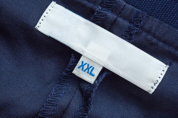 Blank white clothes label close up