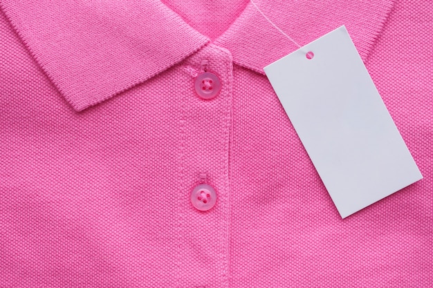 Blank white clothes tag label on new shirt