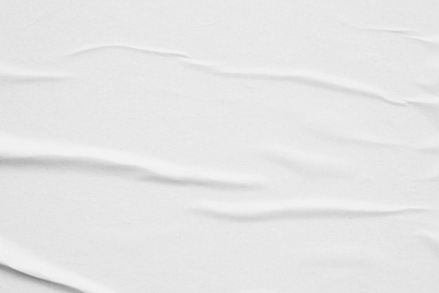 Blank white crumpled and creased paper poster texture background