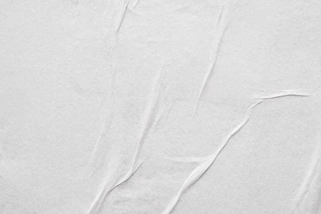 Photo blank white crumpled and creased paper poster texture background