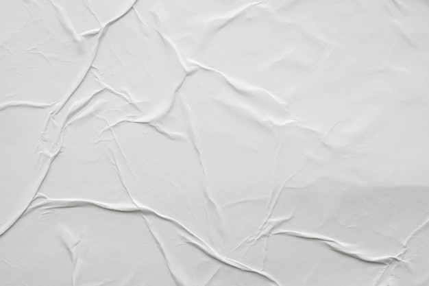 Пустой белый мятой и мятой бумаги плакат текстуры фона