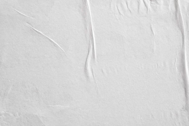 Blank white crumpled and creased paper poster texture