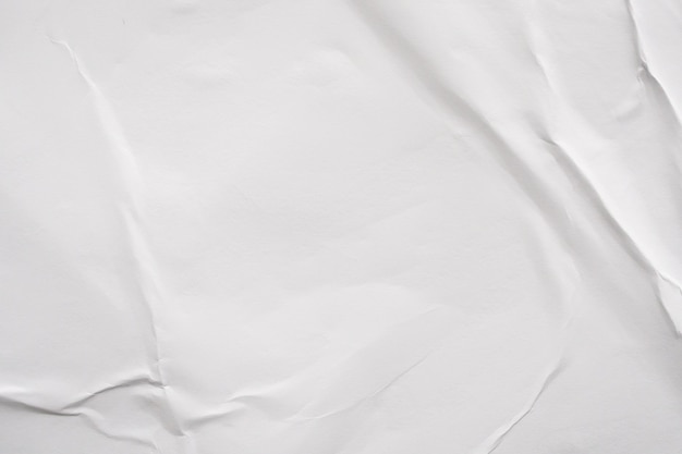 Blank white crumpled and creased paper poster texture