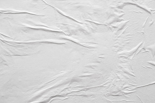 Blank white crumpled and creased paper poster texture