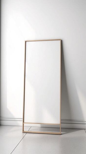 A blank white frame on a white wall