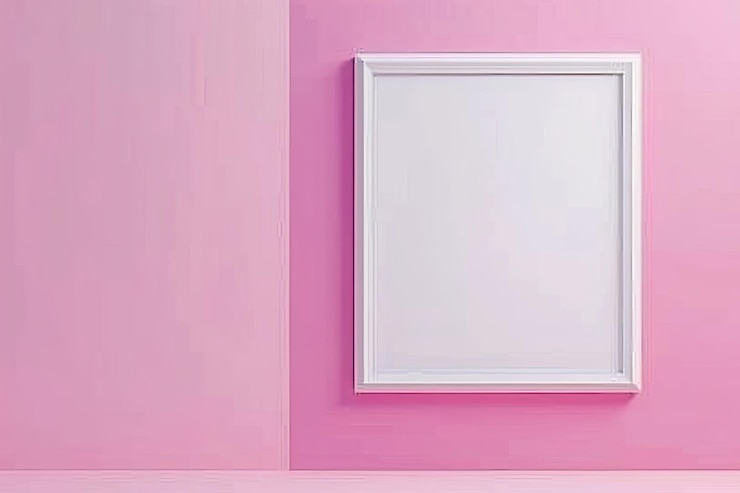 Photo blank white frame with pink border against pink background