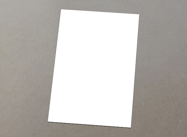 Blank white paper A-4 flyer on texture background