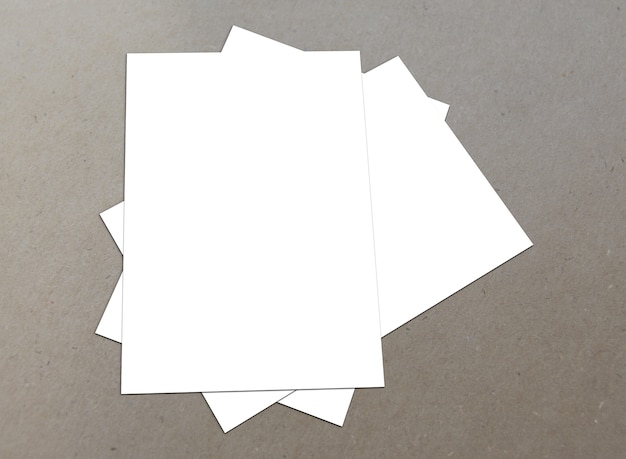 Blank white paper A-4 flyer on textured background