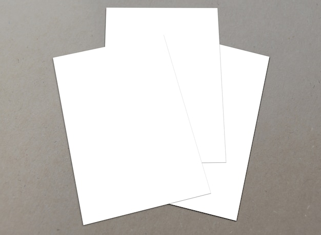 Blank white paper A-4 flyers on background