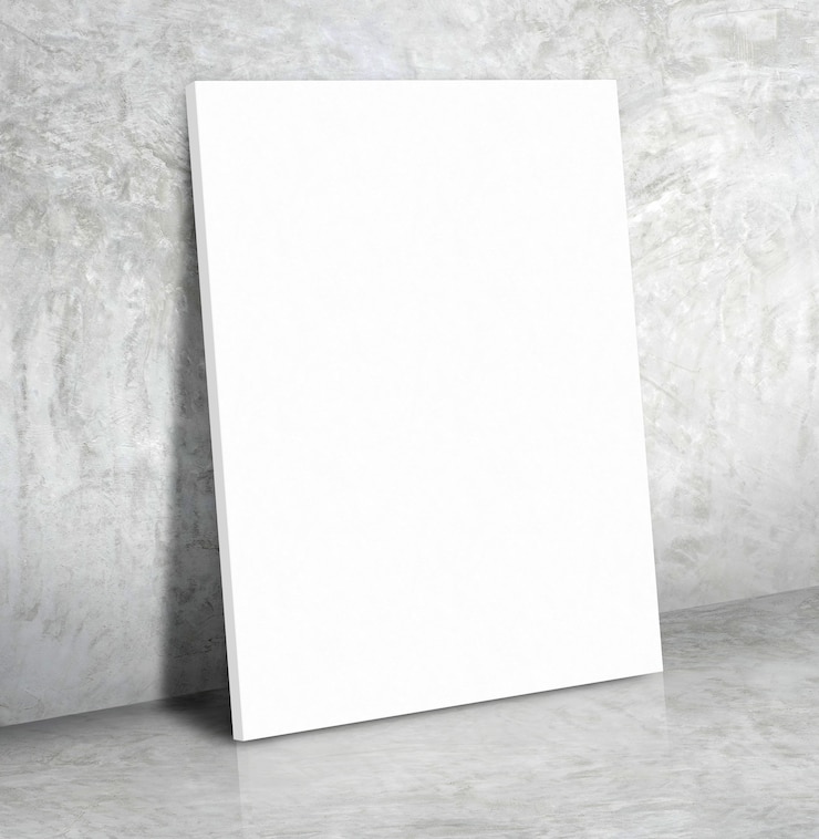 Photo blank white paper poster on the grey concrete wall and cement floor