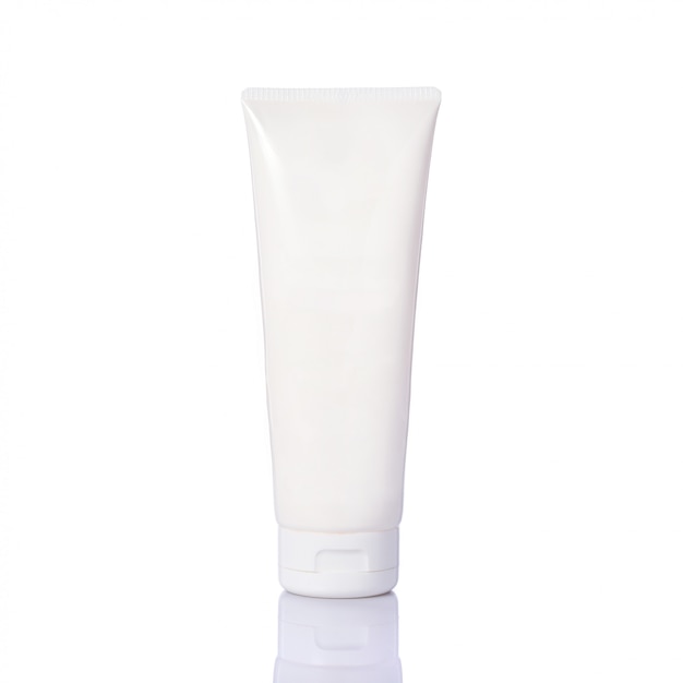 Blank white plastic bottle used for skin cream.