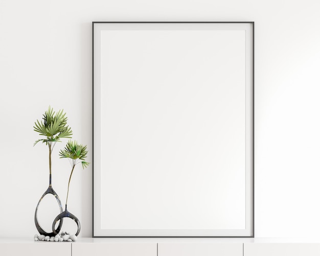 Blank white poster frame black frame in the livingroom elegant simple white wall modern display cabinet table top white book black vase green leaf bouquet decorative stones 3D rendering