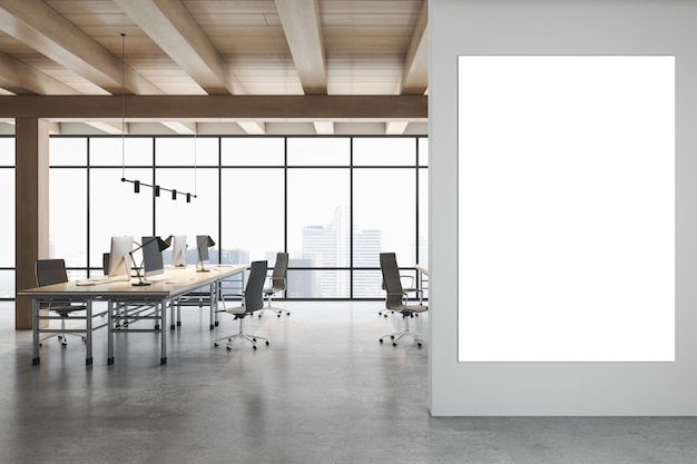 Blank white poster on grey wall in spacious stylish eco office with minimalistic work places on concrete floor and city view through glass wall 3D rendering mockup