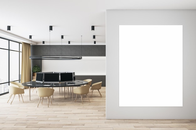 Blank white poster on light wall in coworking space with modern\
furniture wooden floor and big window mockup