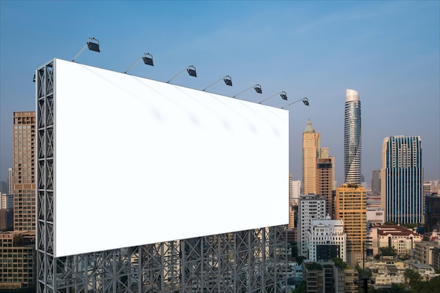 Blank white road billboard with Bangkok cityscape background at sunset Street advertising poster mock up 3D rendering Side view The concept of marketing communication to promote or sell idea