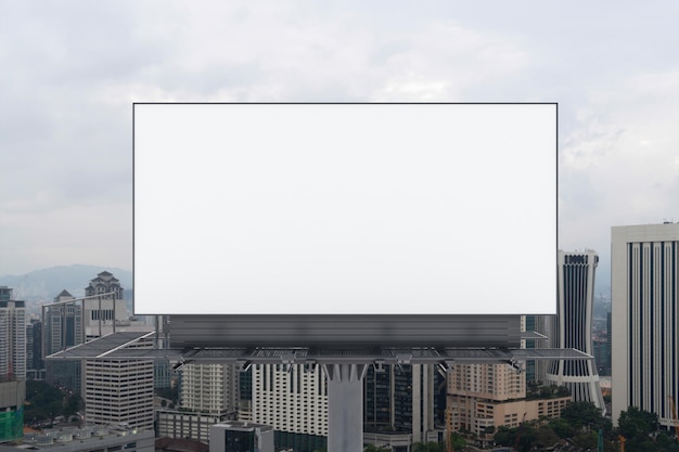 Blank white road billboard with KL cityscape background at day time Street advertising poster mock up 3D rendering Front view The concept of marketing communication to promote or sell idea