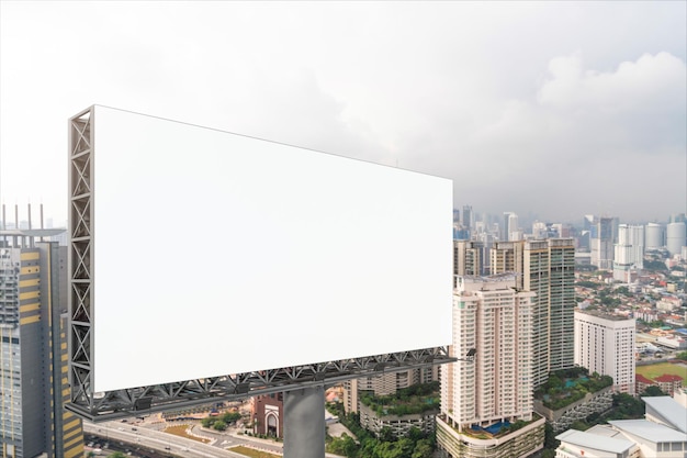 Blank white road billboard with KL cityscape background at day time Street advertising poster mock up 3D rendering Side view The concept of marketing communication to promote or sell idea