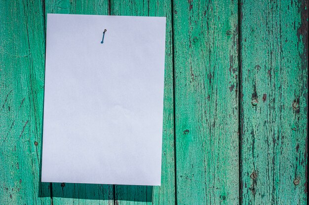 Blank white sheet hanging on a wall