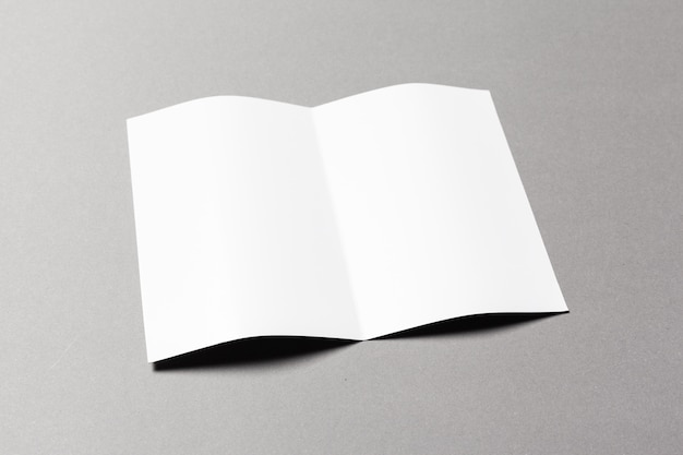 Blank white sheet of paper folded as a bi-fold brochure